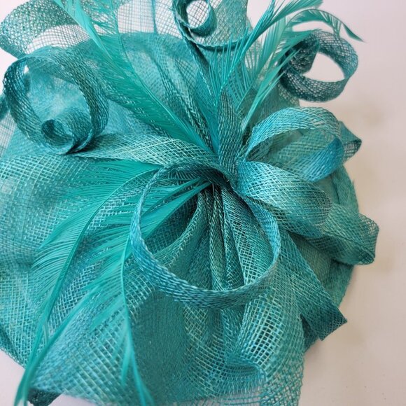 Teal Blue Fascinator with an Upturned Brim Sinamay Loops Rosettes and Feathers - Picture 15 of 16